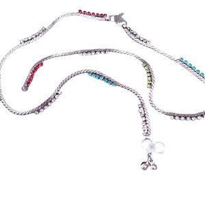 Vintage silver colored necklace with bars of rhinestones.